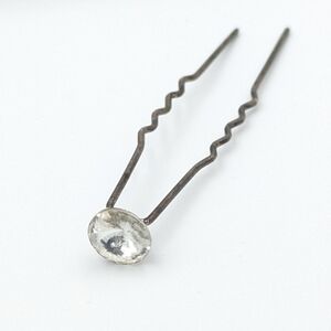 Antique or late vintage U shape hair pin with large clear rhinestone